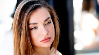 Sensational brunette peels off her lingerie and poses