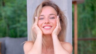 Adorable blonde poses in her lingerie and squeezes her natural boobs